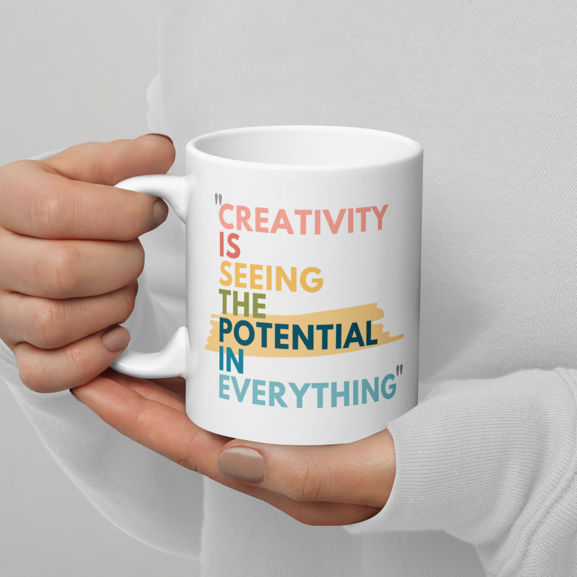 11 oz white glossy mug with the caption Creativity is Seeing the Potential in Everything. A Great gift for creative minds, a mug for artists, even makes a fun inspiring pencil holder for the office or craft room. The Bold colorful text makes the design stand out. 
