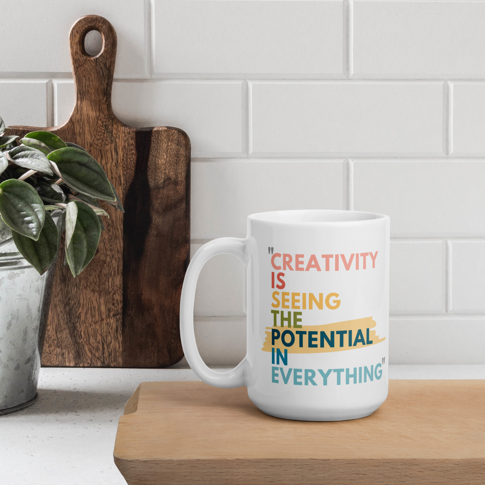 15 oz white glossy mug with the caption Creativity is Seeing the Potential in Everything. A Great gift for creative minds, a mug for artists, even makes a fun inspiring pencil holder for the office or craft room. The Bold colorful text makes the design stand out. 
