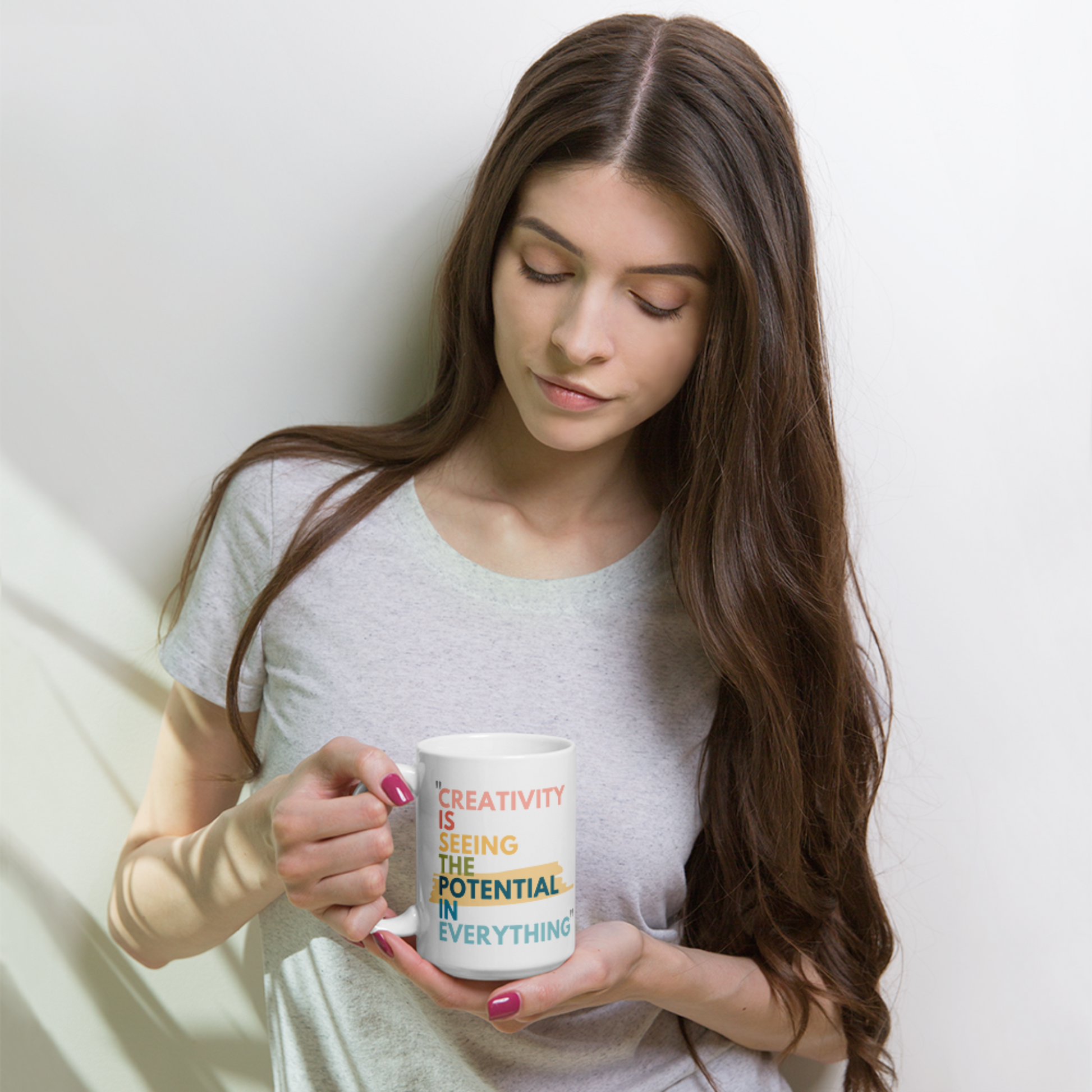 15 oz white glossy mug with the caption Creativity is Seeing the Potential in Everything. A Great gift for creative minds, a mug for artists, even makes a fun inspiring pencil holder for the office or craft room. The Bold colorful text makes the design stand out. 